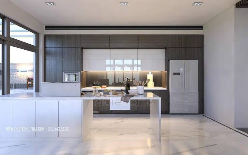 Tủ bếp được làm từ gỗ công nghiệp An Cường và được trang trí bởi đá ốp nhân tạo cao cấp, mang lại vẻ đẹp hiện đại và độc đáo cho phòng bếp.